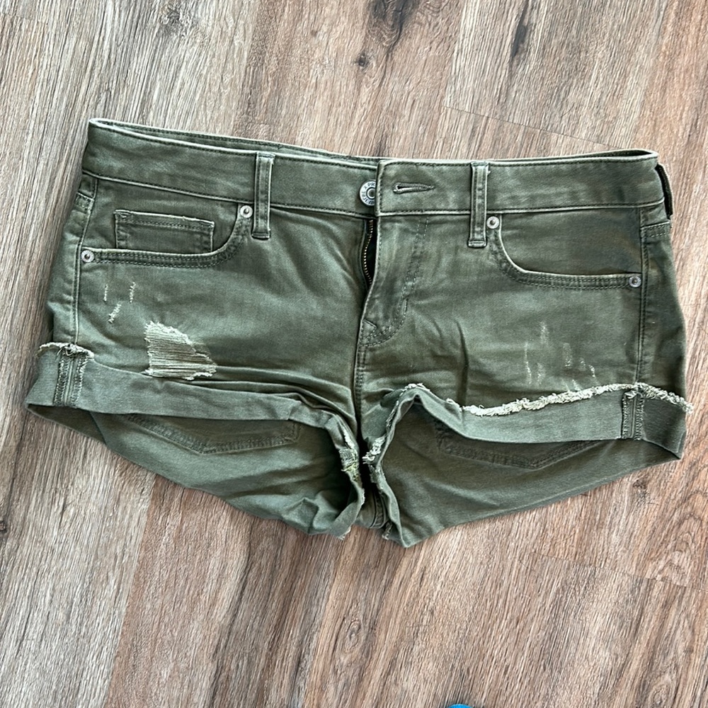 Express distressed green shorts
